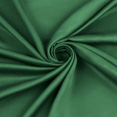 a close up shot of a green fabric