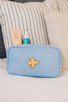 This large cosmetic bag is perfect for the girl on the go! It's such a good size to hold all of your make-up and accessories. We love this size cosmetic bag for weekend getaways at the beach or going home for the holidays. We also love that this cutie can be personalized to be all your own! Patch placements are as pictured. We are unable to accommodate copyrighted phrases/abbreviations/initials. Personalized items are final sale. Preppy Makeup, Preppy Stuff, Large Cosmetic Bag, Face Makeup Tips, Vanity Bag, Preppy Girl, Cruise Outfits, Home For The Holidays, Pencil Cases