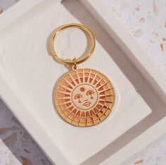 Keychains | El Sol Boho Keychain | Loomshine Enamel Keychain, Boho Keychain, Gold Highlights, Beauty Design, Soft Enamel, Cute Keychain, All Is Well, Face Design, Key Rings