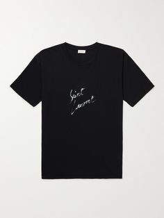 The logo on SAINT LAURENT's T-shirt is designed to look like it's been written by hand with a brush pen. Cut from soft cotton-jersey in a relaxed shape, this piece has a raw-cut hem and is long through the body. Throw it on with a pair of the label's trademark skinny jeans. Saint Laurent Collection, Designer T Shirts, Tshirt Design Men, Designer Menswear, Mens Designer Fashion, Plain Tshirt, Brush Pen, Black Logo, T Shirt For Men