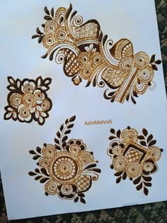 hendi designs for the brides on their wedding day, in gold and brown