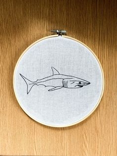 a embroidery project with a shark on it