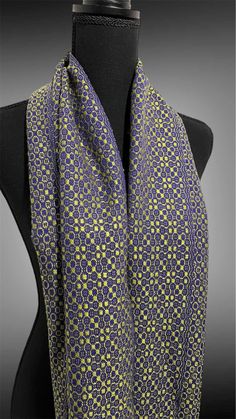 This handwoven scarf features the striking duo of Royal purple (cotton) and Lemongrass (tencel).  It's an eye-catching fall or winter accessory  to add a burst of color next to your coat on a chilly day!  The tencel has a lovely shine and is soft on the skin. The ends are finished with a twisted fringe.  approximately 11.25 x 67 inches plus the twisted fringe. Care: hand wash and lay flat or hand to dry.  Press on medium heat to bring out the shine of the tencel! Tiny Tassels Shawl, Handwoven Garments, Weaving Ideas, Handwoven Scarf, Royal Purple, Winter Accessories, Gift Accessories, Festival Season, Lay Flat