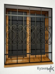 a window with metal bars and wooden panels