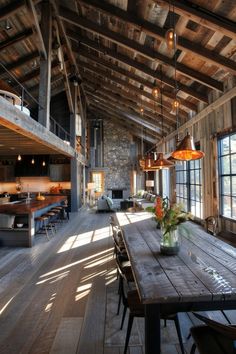 a large wooden table sitting in the middle of a room