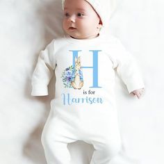 Welcome your newborn baby boy in style with this personalised sleepsuit. The blue letter design adds an extra touch of cuteness! 💙 #newbornbaby #personalisedbabygift #babyclothing #babyboyfashion #babyarrival #AmazonUK #HoolarooUK Baby Christmas Pajamas, Personalized Easter Bunny, Rabbit Baby, Baby Arrival, Personalized Easter, Boy Blue, Baby Boy Fashion