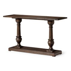 a wooden table with two pillars on top