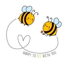 two bees are flying in the air and one is holding a flower with its mouth