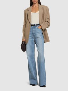 Concealed front button closure. Belt loops. Stonewashed coloring may vary. Five pockets. SIZING:,Inseam: 27in,Rise: 11in,Leg opening: 14.5in. Model is wearing a size27 Light Wide Leg Jeans Outfit, 70s Jeans Outfit, High Rise Wide Leg Jeans Outfit, 70s Jeans, Wide Leg Jeans Outfit, Jeans Outfit Women, High Rise Wide Leg Jeans, 2024 Style, Jeans Wide