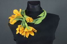 "Large yellow flower necklace - lariat / wrap necklace. Unique felted necklace handcrafted using a delicate merino wool, shapes like a long light green stem with large yellow flowers at both ends. You can wrap it around your neck several times or wrap it once and let it fall free until your waist. Perfect for special occasions, when you want to stand out and feel exceptional. Length of necklace: 148 cm / 58.26\" Single rope. It is a 100% handmade, unique item, but if you like the design, contact Handmade Unique Jewelry For Spring, Yellow Flower Necklaces For Jewelry Making, Handmade Flower Necklace For Spring, Handmade Yellow Necklace For Spring, Handmade Unique Lariat Necklace For Gift, Handmade Unique Lariat Necklace As A Gift, Unique Handmade Lariat Necklace For Gift, Elegant Yellow Necklace For Spring, Handmade Necklaces As Spring Gifts