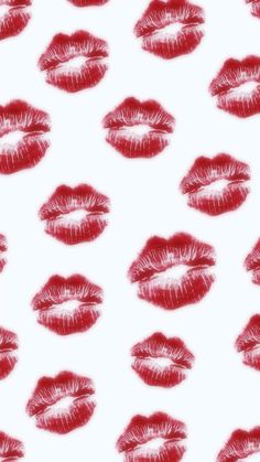 many red lips are arranged on a white background