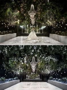 the wedding dress is on display in front of an elaborate chandelier and flowers