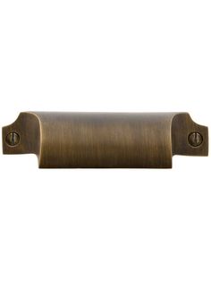 an antique brass door handle on a white background