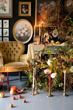 a living room filled with furniture and flowers