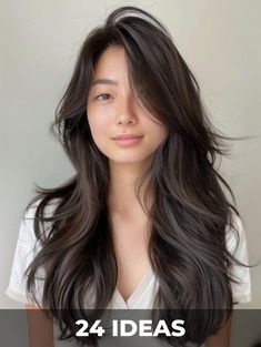 Update your hairstyle with any of these 24 layered haircuts for long hair. They are perfect for creating an illusion of volume and making a stylish statement. Long Haircut For Thick Hair Asian, Whispy Hairstyles Long Layered, Asian Haircut Long, Layered Haircuts For Volume, Long Layered Haircuts For Thick Hair, Haircuts For Volume, Long Hair Layered, Layered Haircuts For Long Hair