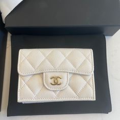 Brand New Chanel Classic Small Wallet Coco Mark Trifold Caviar Skin White. Come With Dust Bag, Box, Bag Material : Caviar Leather Color : White Chanel Small Flap Wallet, Luxury Bifold Coin Purse With Coin Pocket, Designer White Envelope Bag, Luxury Compact Travel Wallets, Elegant Card Holder With Card Slots, Designer Rectangular Coin Purse For Travel, Luxury Coin Purse For Everyday Use, Luxury White Wallets With Card Slots, Classic Bifold Cream Wallet