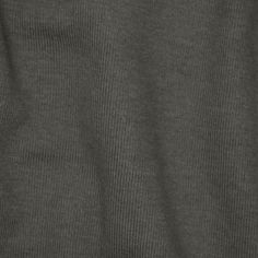 a close up view of the back of a gray sweater