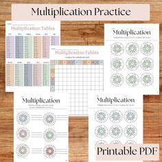 the printable worksheet for multiplication practice is displayed on a wooden table