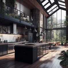 a large kitchen with lots of windows and plants in the center, along with wooden flooring