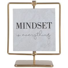 a sign that says mindset as everything is in gold frame on a white background