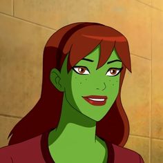 an animated woman with red hair and green skin looks at the camera while standing in front of a tiled wall