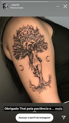 a person with a tree tattoo on their arm