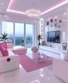 a living room filled with white furniture and pink accents