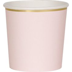 a pink paper cup with gold rim