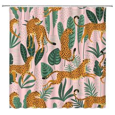 a shower curtain with cheetah and leaves on it in pink, green and yellow