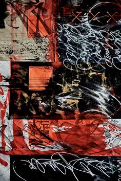 an abstract painting with black, red and white colors