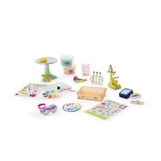 an assortment of toys and accessories on a white background