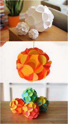 three different types of paper balls on a table