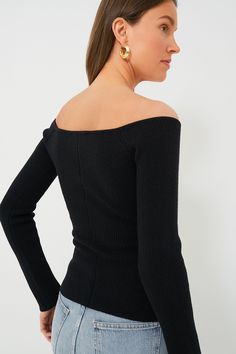 A luxuriously soft wardrobe staple, the Black Knit Nicola Top is exactly what you'll want to wear on your next date night. The wide V-neckline allows you to show some skin while remaining chic and sophisticated, and that fabulous ribbed knit material with a hint of stretch and compression will have you looking and feeling your best. Done in a classic black hue for styling versatility, we love pairing this number with denim, mini skirts, and more for a timeless look you're sure to get some compli Denim Mini Skirts, Compression Fabric, Denim Mini, Knitting Materials, Black Knit, Raglan Sleeve, Wardrobe Staples, Fabric Material, Classic Black