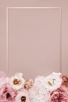 pink and white flowers are in front of a square frame on a beige background with gold trim