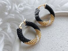 💖 These handmade black and gold seed bead beaded hoop earrings are the perfect accessory for any occasion. Whether you're looking for a unique gift for your sister-in-law's birthday or any jewelry lover in your life, these statement earrings are sure to impress. Surprise her with these eye-catching earrings that are sure to make a stylish statement wherever she goes. Plus, they are ready to ship, so you can enjoy them in no time! Add a touch of glam to any outfit with these unique chunky hoop e Handmade Minimalist Hoop Earrings For Party, Minimalist Handmade Hoop Earrings For Party, Black Beaded Small Hoop Earrings As Gift, Handmade Black Hoop Earrings Gift, Handmade Black Hoop Jewelry, Black Minimalist Handmade Hoop Earrings, Minimalist Handmade Black Hoop Earrings, Handmade Black Beaded Small Hoop Earrings, Black Beaded Hoop Earrings Gift