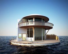 a round house floating on top of the ocean