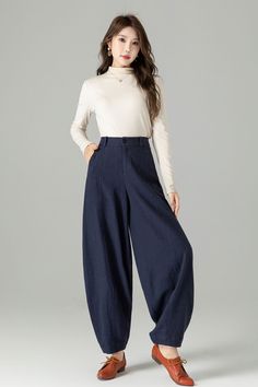 "Deep navy lantern-style wide-leg linen pants. The wide-leg silhouette adds movement and charm, while the high-quality linen fabric provides both comfort and durability. The deep navy color exudes sophistication, making it suitable for various settings. Whether you're aiming for a casual or a more polished look, these deep navy lantern-style wide-leg linen pants will make you stand out with their unique design. DETAIL * 50% linen, 50% cotton * Button and zipper front closure * Two pockets * Ankl Wide Pants Outfit, Long Linen Pants, Loose Fitting Pants, Fall Pants, Baggy Pants, Wool Clothing, Wide Leg Linen Pants, Linen Pants Women, Beautiful Skirts