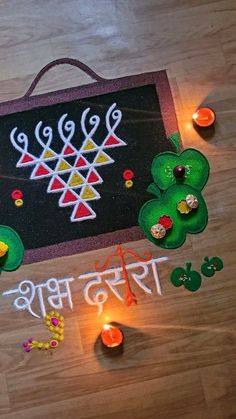 an image of diwali with candles on the floor