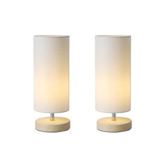 two white lamps sitting next to each other