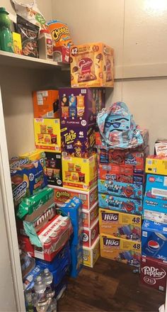 a pantry filled with lots of different types of food and snacks on shelves next to each other