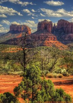 the mountains are red and brown in color