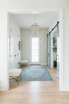 the hallway is clean and ready for us to use as an entrance way in this home