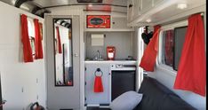 the interior of an rv is clean and ready to be used as a camper