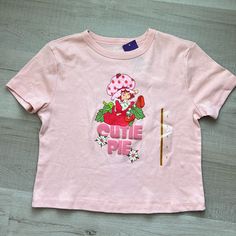 Small Nwt Strawberry Shortcake Cropped T-Shirt. Smoke Free Home. Never Worn Excellent Conditions No Stains Or Damage Trendy Summer Tops From Target, Cute Crew Neck Top With Graphic Print, Sweet Short Sleeve Cotton T-shirt, Sweet Cotton T-shirt With Short Sleeves, Sweet Style Short Sleeve Cotton T-shirt, Casual Cotton Tops From Target, Sweet Cotton T-shirt With Graphic Print, Sweet Graphic Print Crew Neck Tops, Sweet Style Crew Neck Tops With Graphic Print