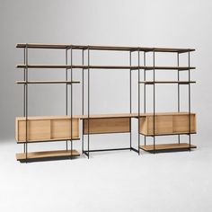 three wooden shelves with metal frames and drawers on each shelf, against a gray background