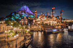 an image of a pirate ship docked at night