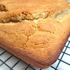 a loaf of bread sitting on top of a cooling rack