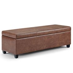 a brown leather storage bench with black legs and footrests on an isolated white background