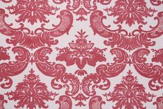 red and white wallpaper with an ornate design