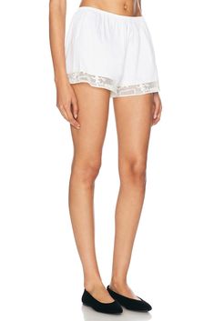 100% cotton.  Made in India.  Dry clean only.  Pull-on styling with elastic waistband.  Poplin fabric with crochet trim.  Item not sold as a set.  .  .  .  .  .  .  .  .  .  . White Lace Shorts, Crochet Trim, Poplin Fabric, Lace Shorts, White Shorts, Tennis, Top Brands, Trim, India